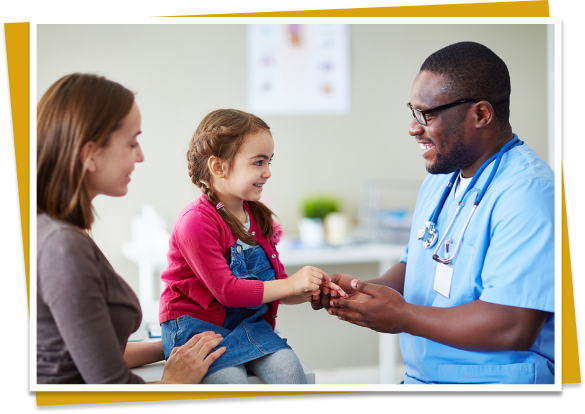 Young girl receives treatment from doctor